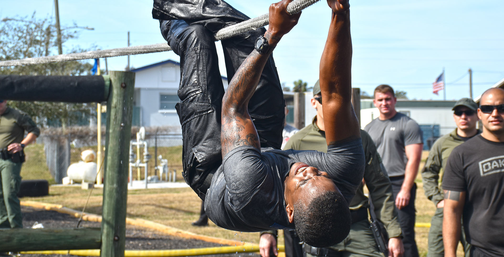 SWAT training with man on rope